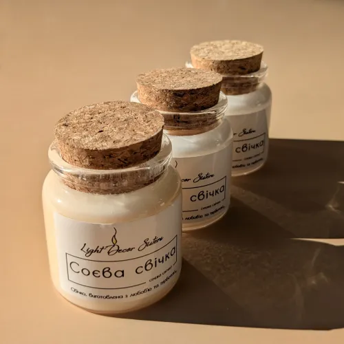 Свічка в скляній баночці з корком