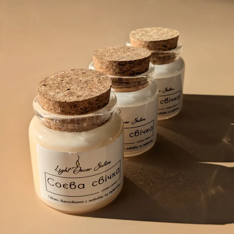 Свічка в скляній баночці з корком